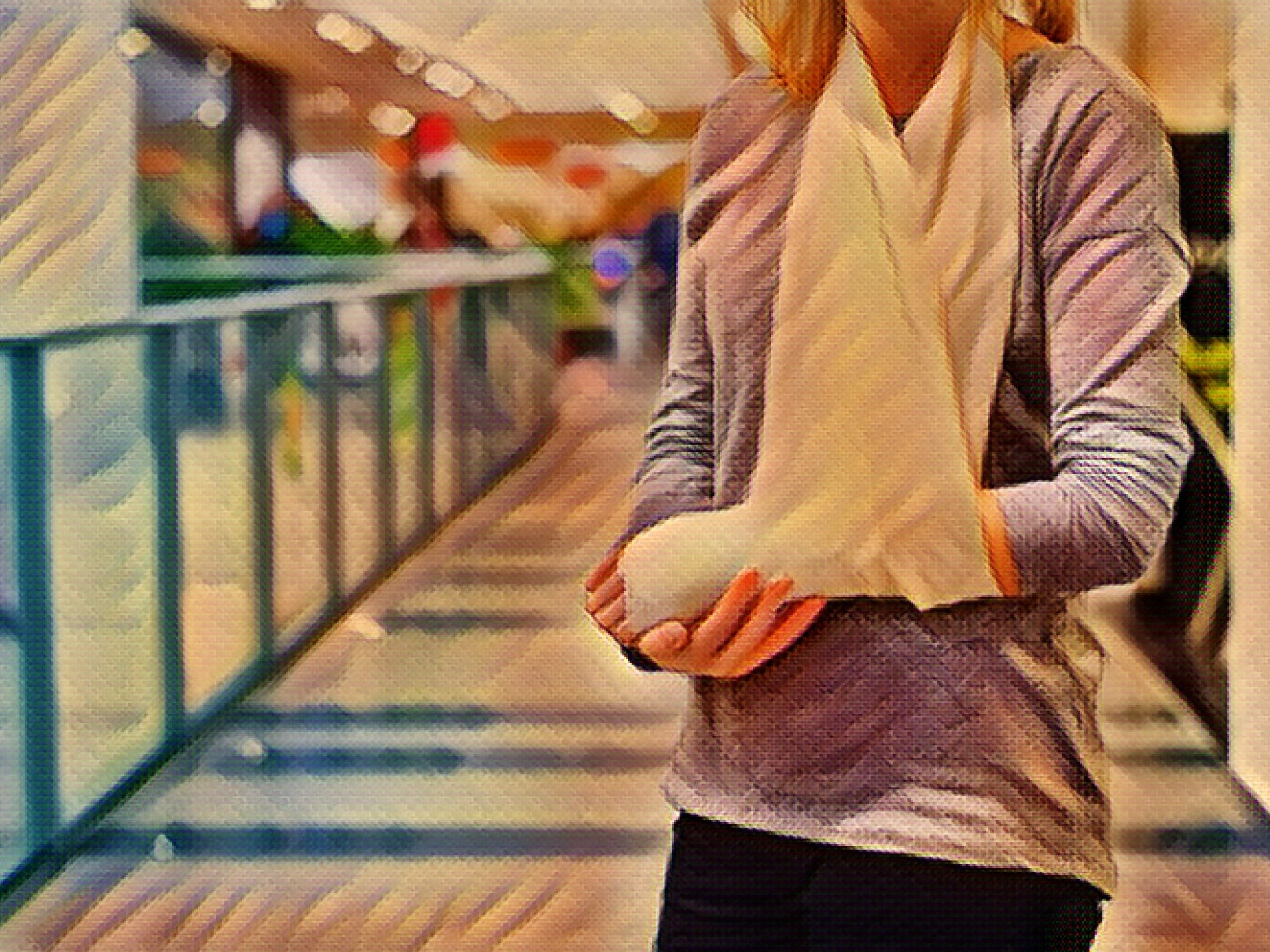 Woman with broken arm in cast