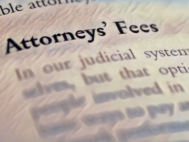 legal or law book with attorneys fees focused in closeup of explanation