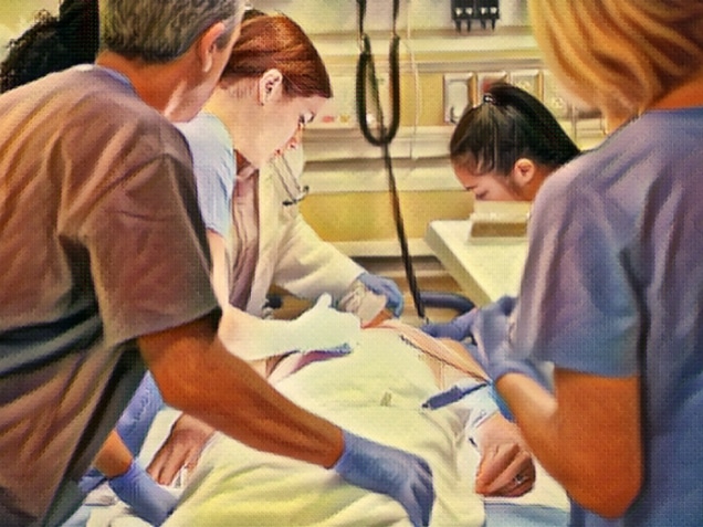 medical team working on patient in emergency room