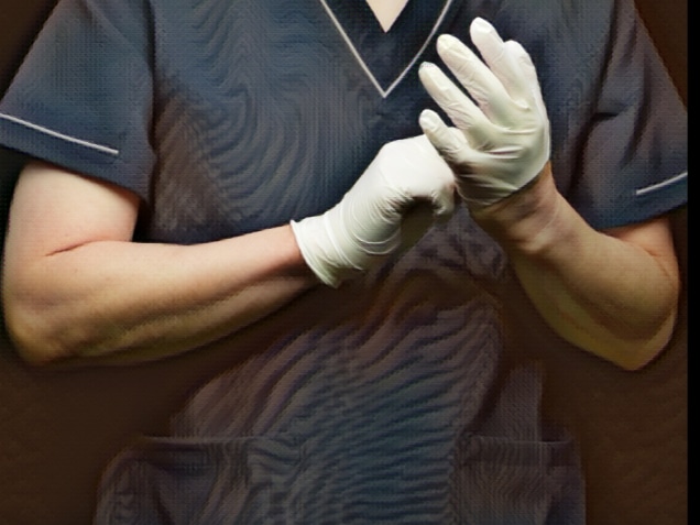 nurse doctor's hands up with gloves