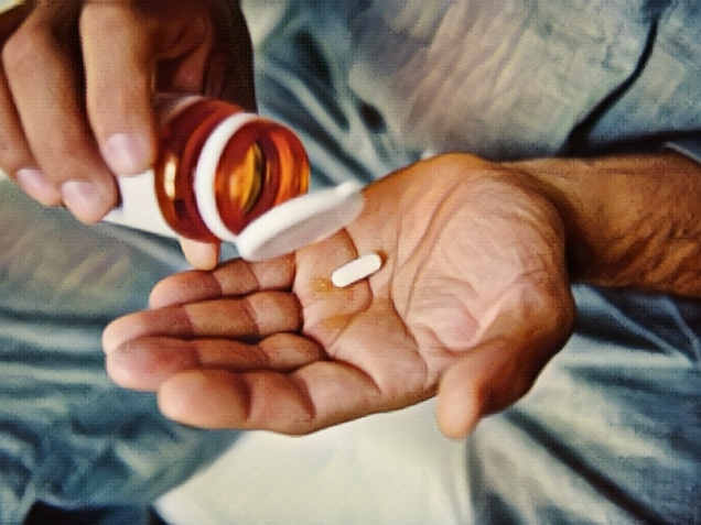 Man taking medication