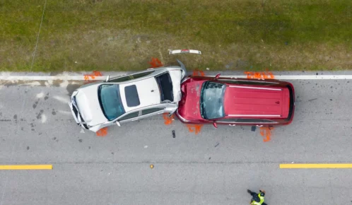 Frontal collision between two cars.