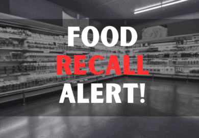 Defocused blur buying milk put on shelf in supermarket with food recall texts.