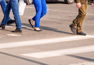 Pedestrians walking on the street.