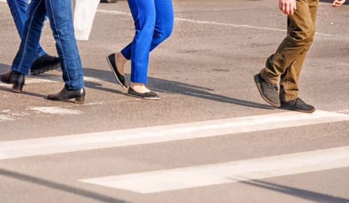 Pedestrians walking on the street.