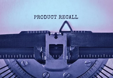 Text Product Recall typed on retro typewriter.