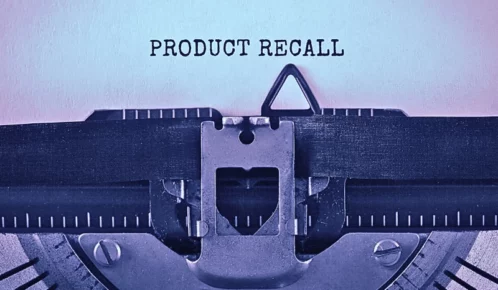 Text Product Recall typed on retro typewriter.