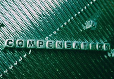 Block of letters spelled Compensation. compensation for Legionnaires' Disease
