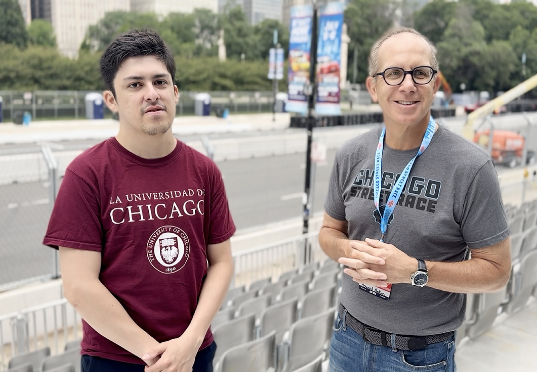 NASCAR Driver Andre Castro poses with Chicago Injury Lawyer Howard Ankin on the racecourse for the fourth of July race in Chicago