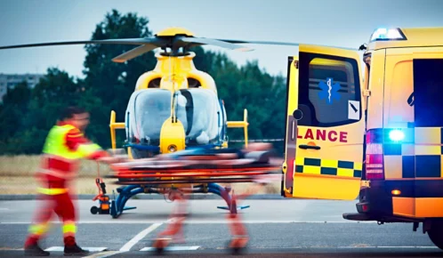 Injured guy being airlifted after a car accident.