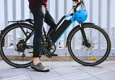 Urban cyclist taking a brake on e-bike. E-Bike Accident Injuries Are on the Rise