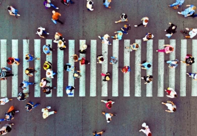 Pedestrian crossing top view. Crosswalk aerial from drone. Crosswalk Accidents Near Chicago Schools