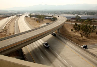 Few cars on an expressway.