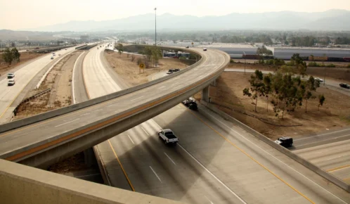 Few cars on an expressway.