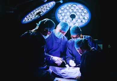 Group of surgeons in hospital operating theater. Medical team performing surgery in operation room. Surgical "Never Events"