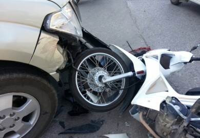 Injuries Reported in Car and Motorcycle Collision Near Lawrence Ave