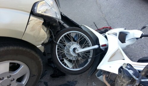Injuries Reported in Car and Motorcycle Collision Near Lawrence Ave