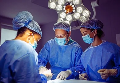 a surgical team in an operating room, focused on performing a procedure. Delayed C-Sections