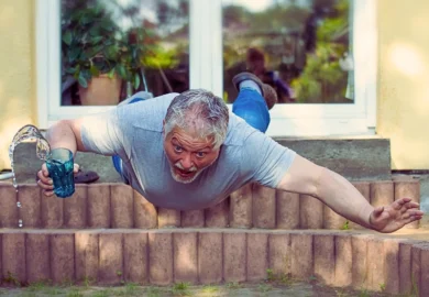 Man falling face-first outdoors while spilling a drink. Liable for Unsafe Property Conditions