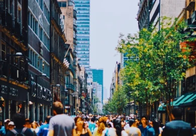 A crowded city street filled with pedestrians. injuries at Chicago street festivals